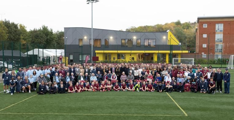 Group photo outside West Ham United Foundation's new community centre 