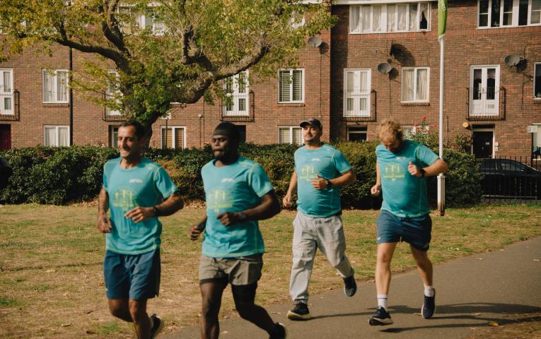 Sanctuary Runners running together in a park 