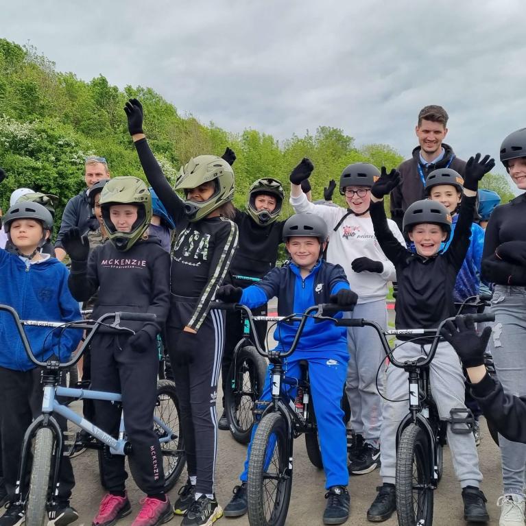 Children on BMX's cheering