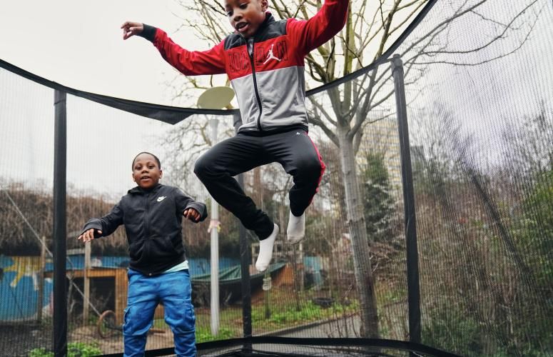 Children playing on a trampoline