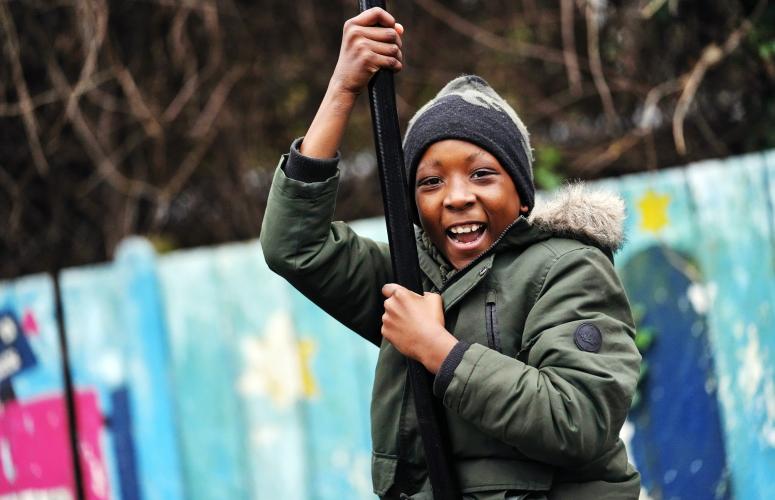 Child playing at Triangle Adventure Playground