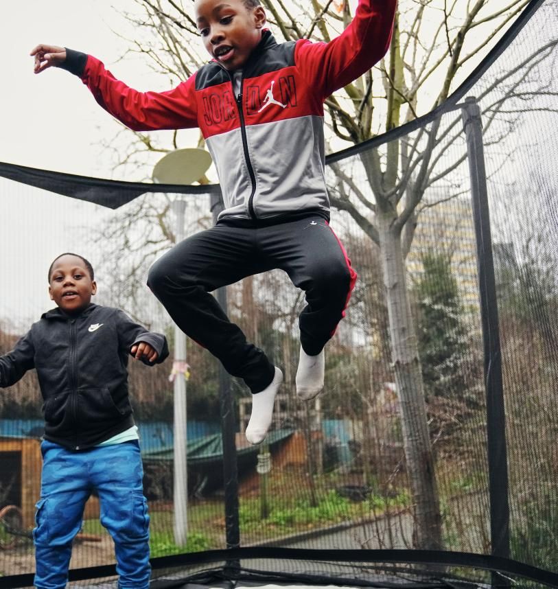 Children playing on a trampoline