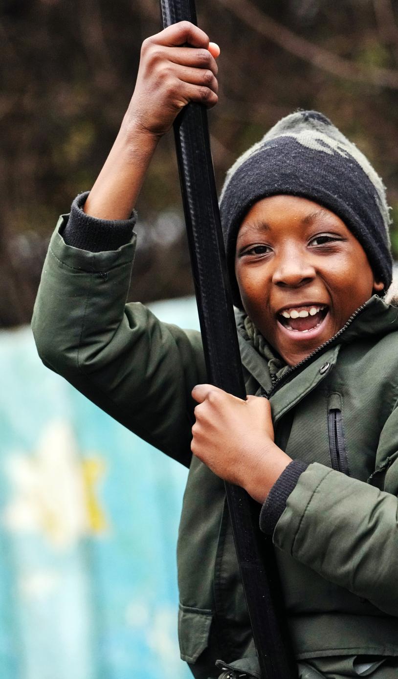 Child playing at Triangle Adventure Playground